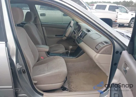 2005 Toyota Camry Le z USA, uszkodzony, nr VIN JTDBE32K153037428